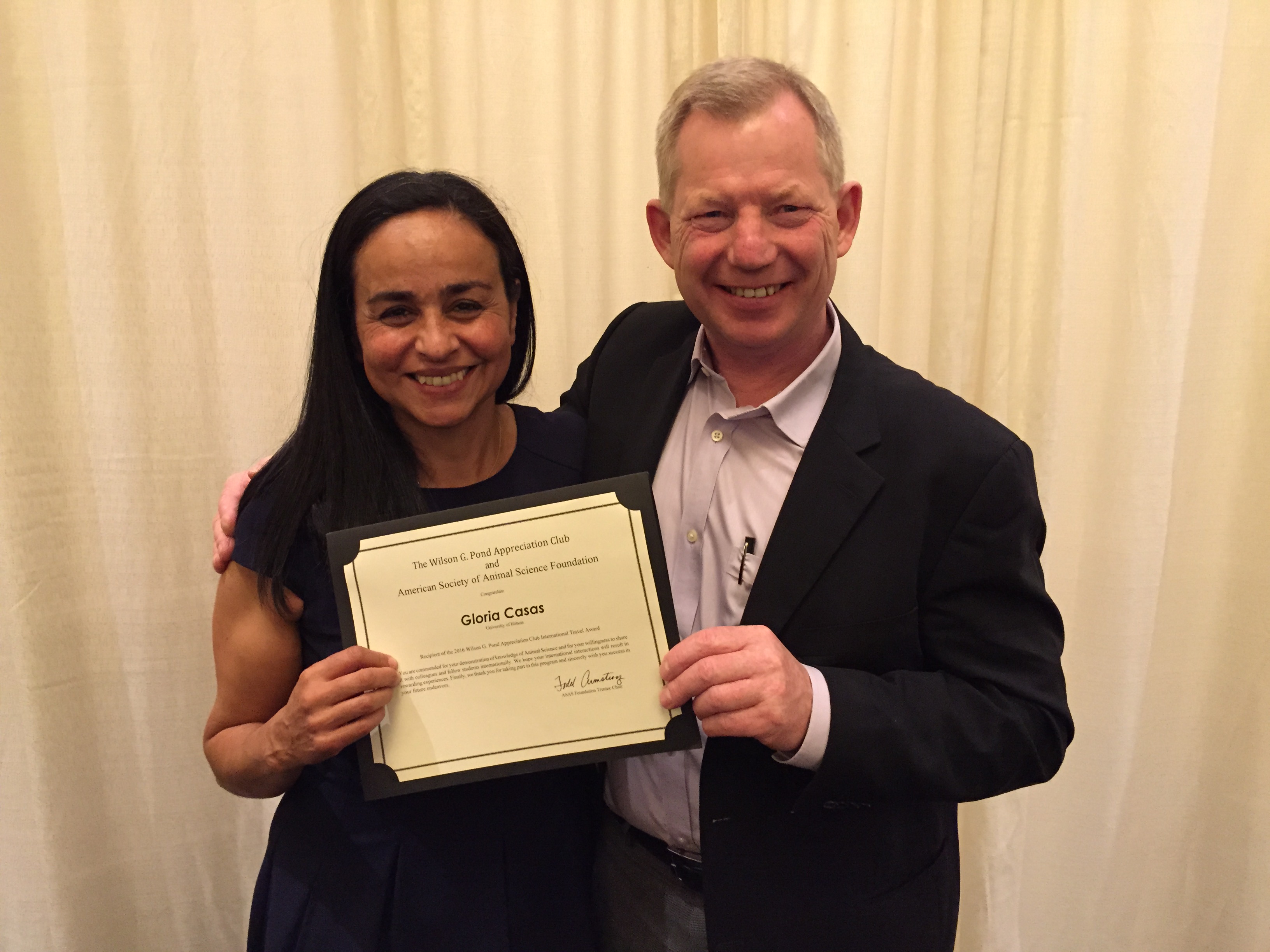 Gloria and Dr. Stein celebrate Gloria's award