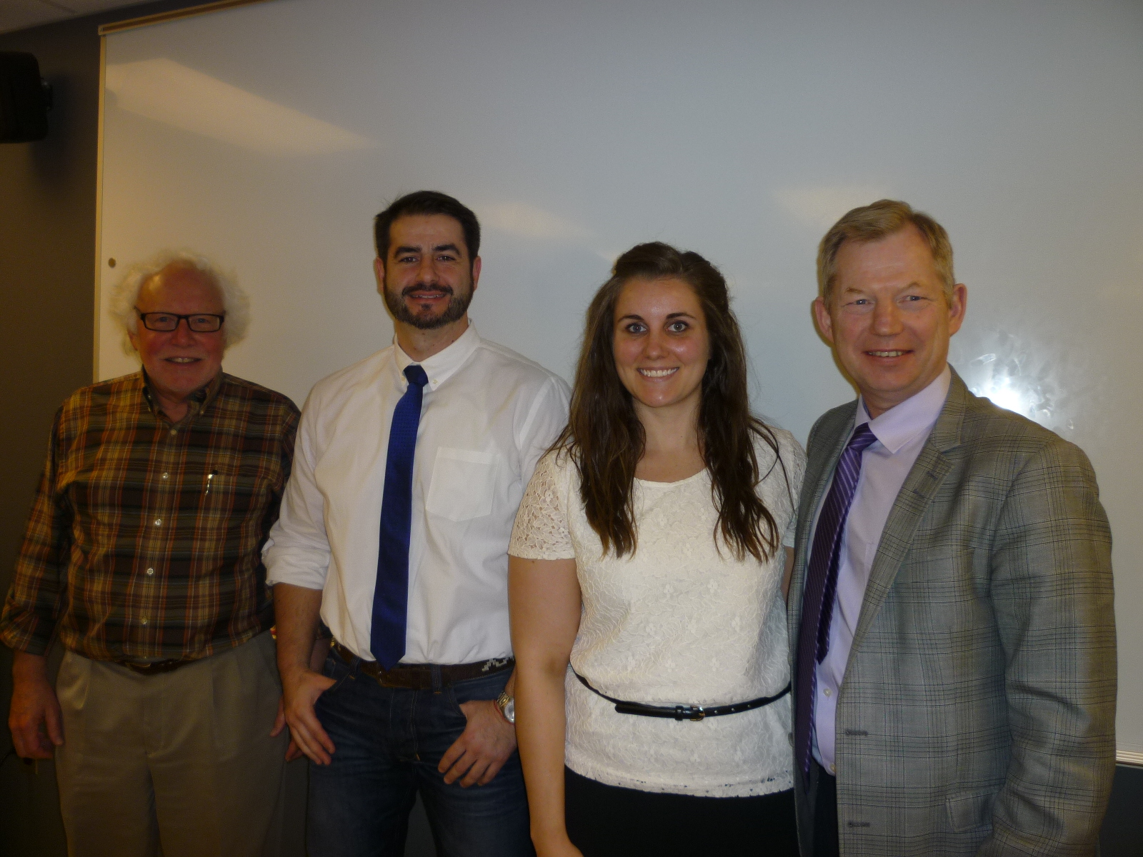 Jessica with her Master's thesis committee after her successful defense on April 14.