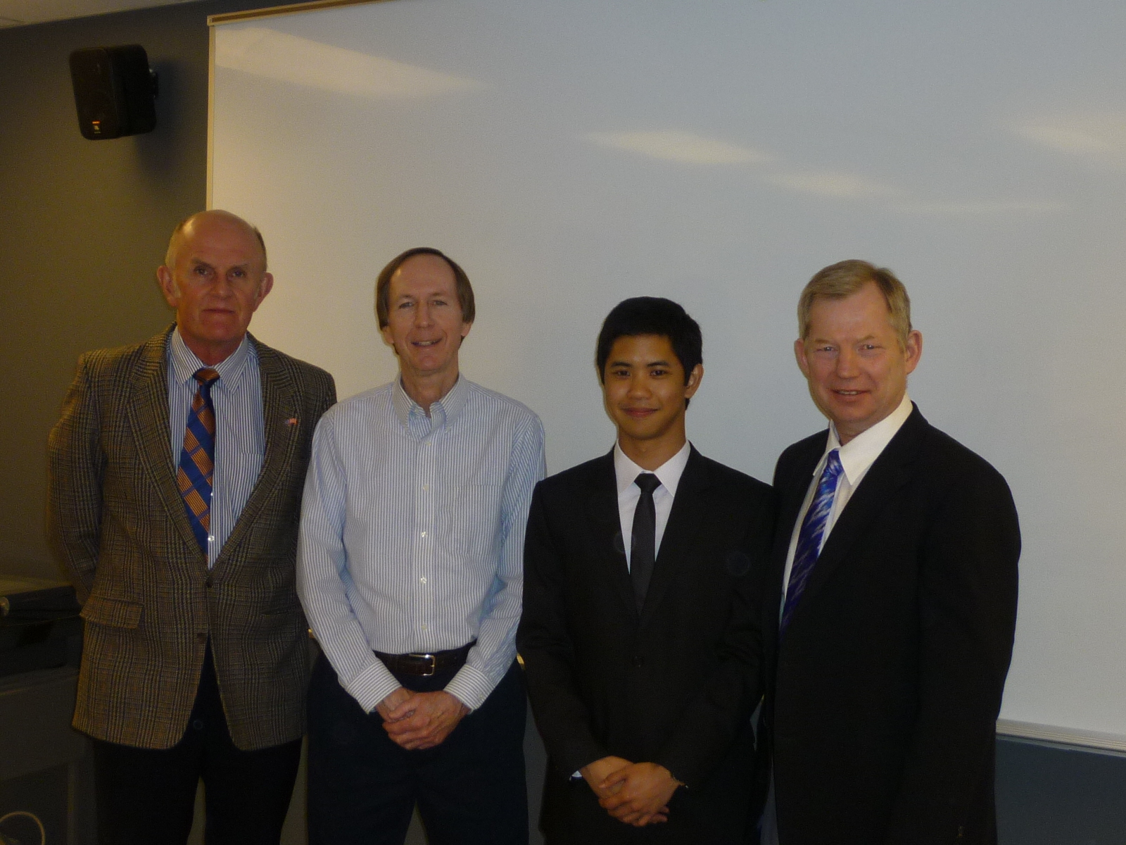 Diego with his Master's thesis committee after his successful defense on April 17.